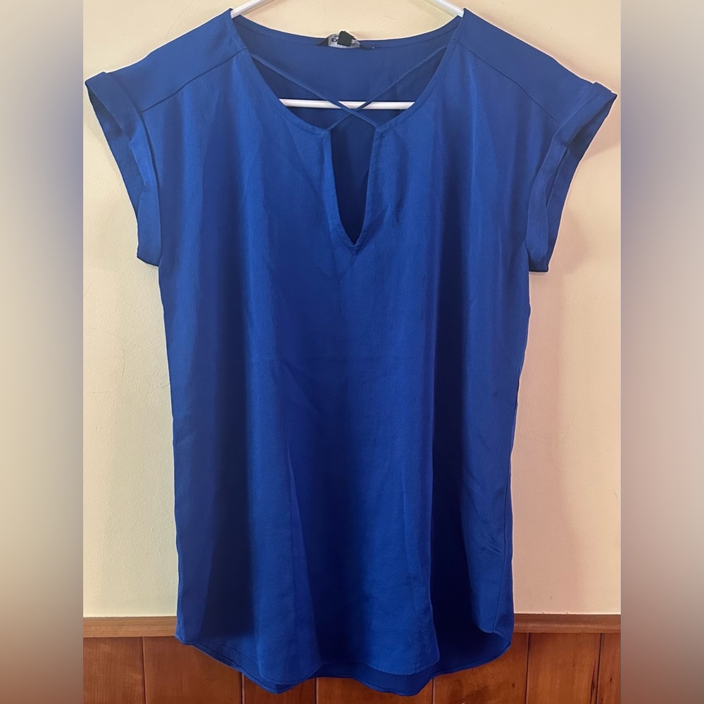 EXPRESS size SMALL, royal blue, criss cross neckline, short sleeved blouse